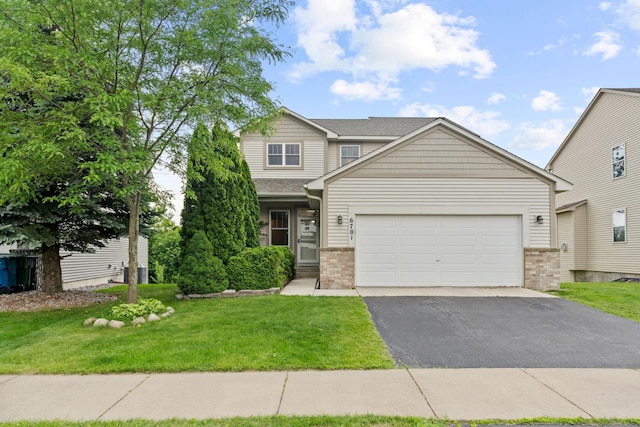 6701 Urbandale Ln N, Maple Grove, MN 55311 - view of front of property with asphalt driveway, brick siding, a garage, and a front lawn