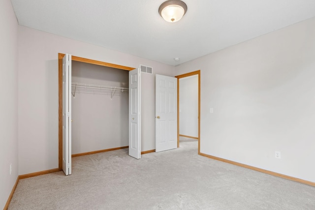 6701 Urbandale Ln N, Maple Grove, MN 55311 - unfurnished bedroom featuring carpet floors and a closet