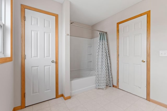 6701 Urbandale Ln N, Maple Grove, MN 55311 - full bathroom with baseboards and shower / bath combo