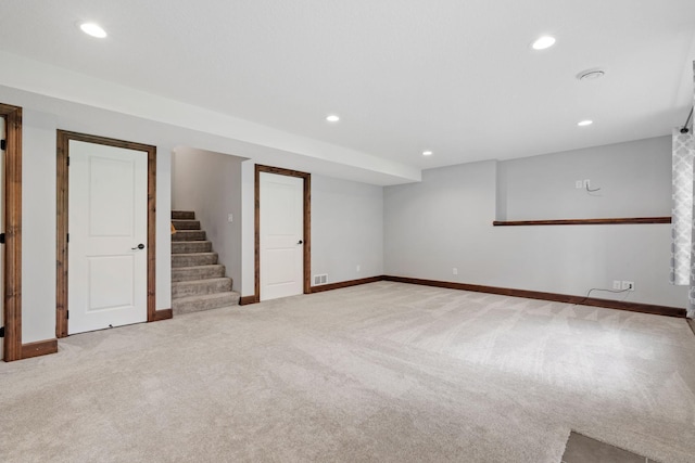 6701 Urbandale Ln N, Maple Grove, MN 55311 - finished basement with recessed lighting, light colored carpet, and stairway