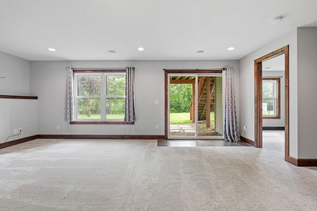 6701 Urbandale Ln N, Maple Grove, MN 55311 - carpeted empty room with healthy amount of natural light, recessed lighting, and a smoke detector