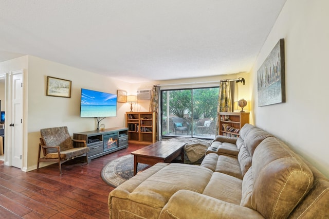 4004 Foss Rd Unit 101, Saint Anthony, MN 55421 - living area with dark wood finished floors and a wall mounted air conditioner