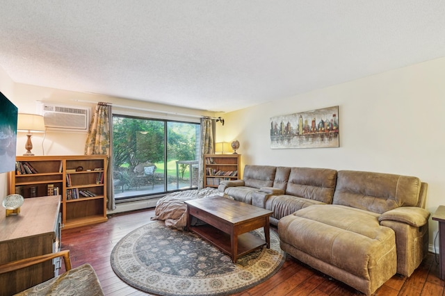 4004 Foss Rd Unit 101, Saint Anthony, MN 55421 - living room featuring an AC wall unit, hardwood / wood-style floors, and baseboard heating