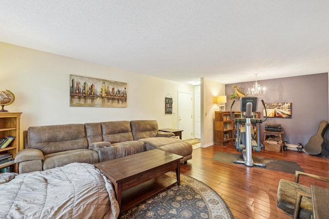4004 Foss Rd Unit 101, Saint Anthony, MN 55421 - living room with hardwood / wood-style floors and a chandelier