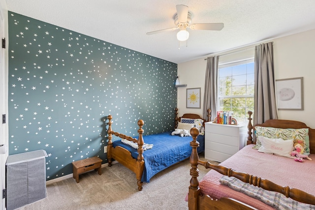 2740 Simons Dr, Chaska, MN 55318 - carpeted bedroom with an accent wall, a ceiling fan, and wallpapered walls
