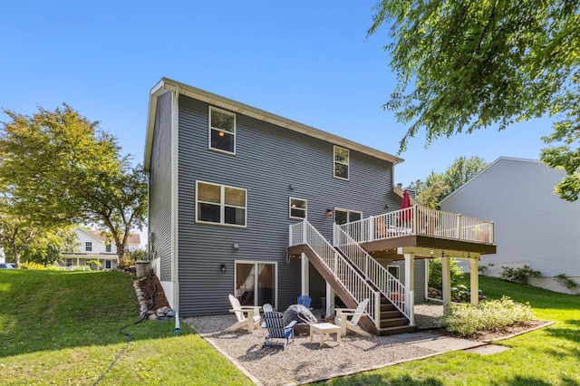 2740 Simons Dr, Chaska, MN 55318 - rear view of property with a deck, stairway, and a lawn
