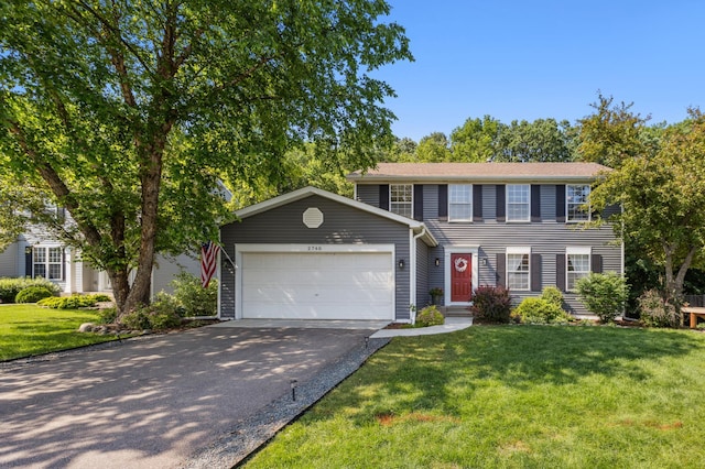2740 Simons Dr, Chaska, MN 55318 - colonial home with asphalt driveway, an attached garage, and a front yard