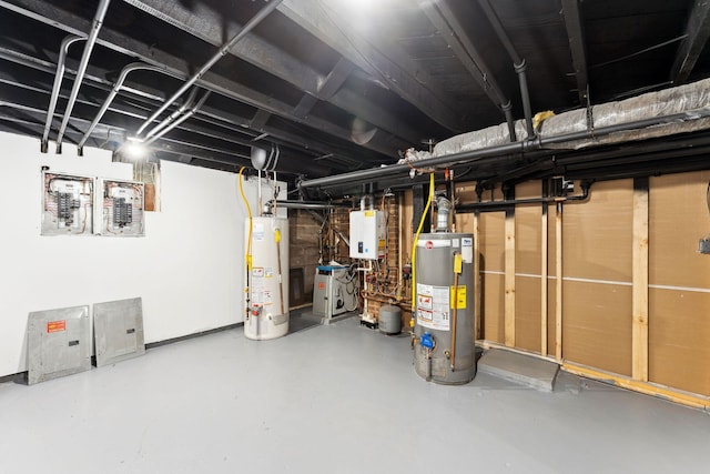 987 Dayton Ave, Saint Paul, MN 55104 - unfinished basement featuring gas water heater and water heater