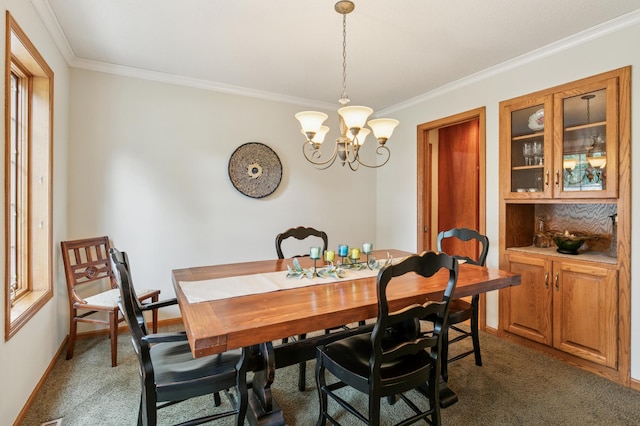 1561 Creek Run Trl, Chanhassen, MN 55331 - carpeted dining area with ornamental molding and a chandelier