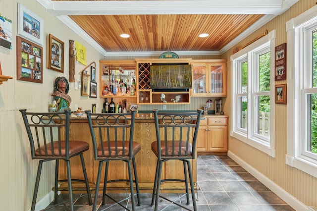 1561 Creek Run Trl, Chanhassen, MN 55331 - indoor dry bar with plenty of natural light, ornamental molding, wood ceiling, dark tile patterned floors, and recessed lighting