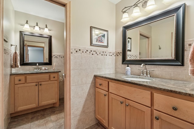 1561 Creek Run Trl, Chanhassen, MN 55331 - bathroom featuring tile walls, vanity, wainscoting, and tile patterned flooring