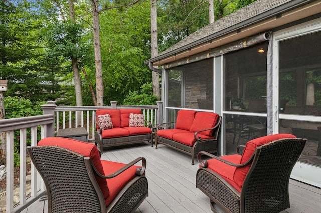 1561 Creek Run Trl, Chanhassen, MN 55331 - wooden terrace with outdoor lounge area, a sunroom, and view of wooded area