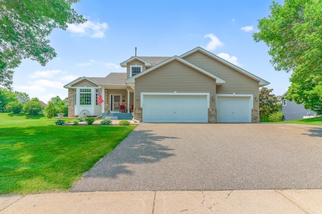 13589 Birch Rd, Rogers, MN 55374 - traditional-style house featuring a garage, asphalt driveway, a front yard, and stone siding