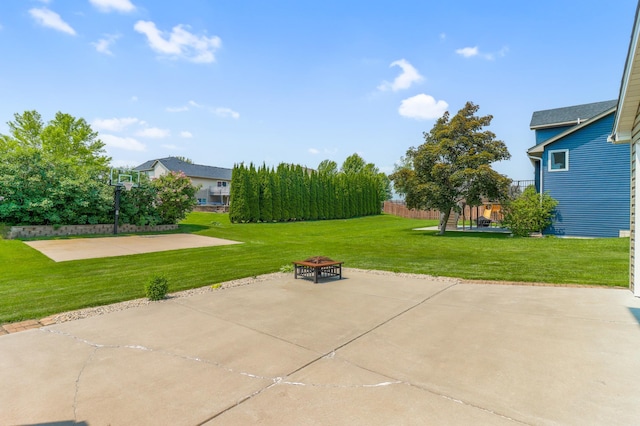 13589 Birch Rd, Rogers, MN 55374 - view of patio / terrace with a fire pit