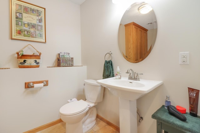 13589 Birch Rd, Rogers, MN 55374 - bathroom featuring toilet and tile patterned floors