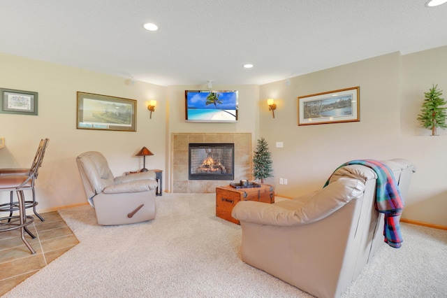 13589 Birch Rd, Rogers, MN 55374 - carpeted living area featuring recessed lighting and a fireplace