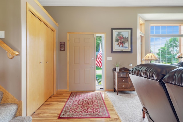 13589 Birch Rd, Rogers, MN 55374 - foyer entrance featuring light wood finished floors and stairway