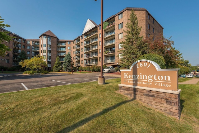 2601 Kenzie Ter Unit 402, Saint Anthony, MN 55418 - view of apartment building / complex with uncovered parking