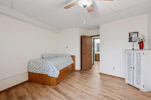 2601 Kenzie Ter Unit 402, Saint Anthony, MN 55418 - bedroom featuring light wood-type flooring and ceiling fan