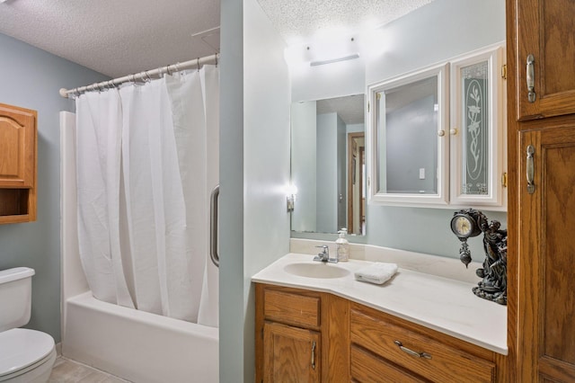2601 Kenzie Ter Unit 402, Saint Anthony, MN 55418 - bathroom featuring a textured ceiling, vanity, and shower / tub combo