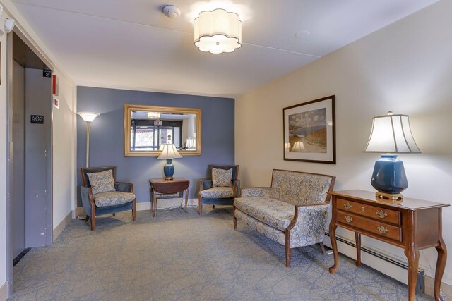 2601 Kenzie Ter Unit 402, Saint Anthony, MN 55418 - living area with a baseboard heating unit and carpet