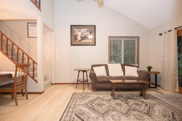 544 Auburn Pl NW Unit H, Elk River, MN 55330 - living area with stairway, wood finished floors, high vaulted ceiling, and a ceiling fan