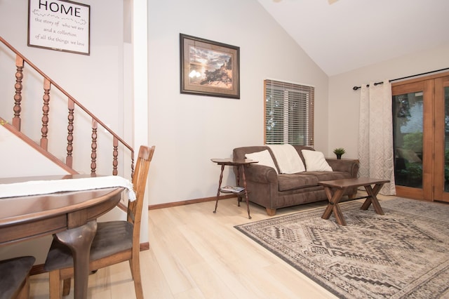 544 Auburn Pl NW Unit H, Elk River, MN 55330 - living area with light wood finished floors, stairs, and high vaulted ceiling