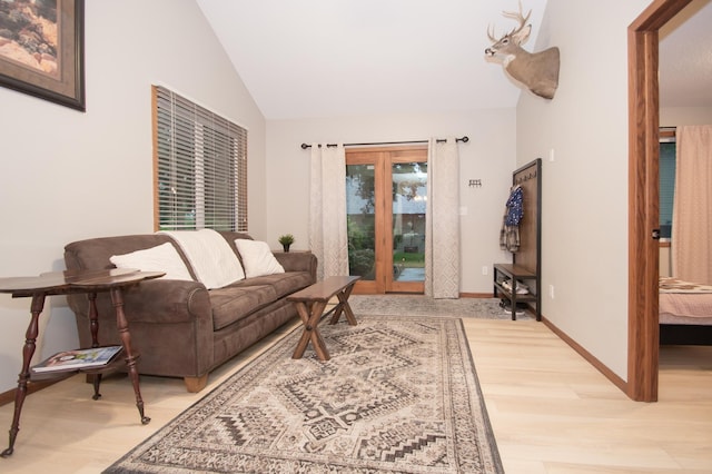 544 Auburn Pl NW Unit H, Elk River, MN 55330 - living area with vaulted ceiling and wood finished floors