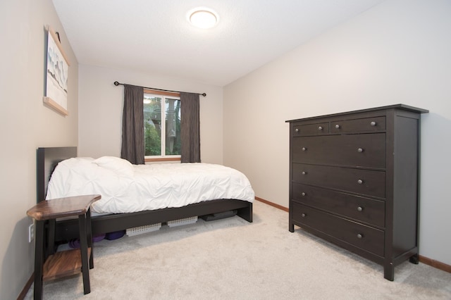 544 Auburn Pl NW Unit H, Elk River, MN 55330 - bedroom featuring light carpet and vaulted ceiling