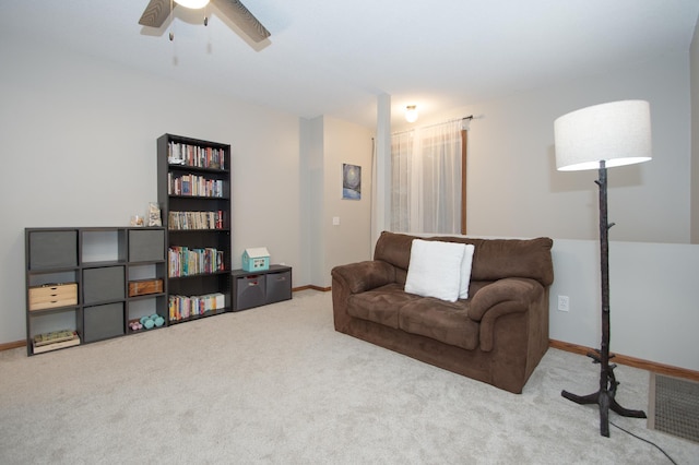 544 Auburn Pl NW Unit H, Elk River, MN 55330 - carpeted living room featuring ceiling fan and baseboards
