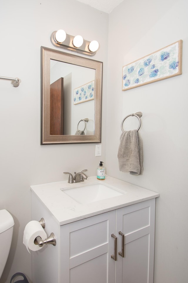 544 Auburn Pl NW Unit H, Elk River, MN 55330 - half bathroom with vanity and toilet