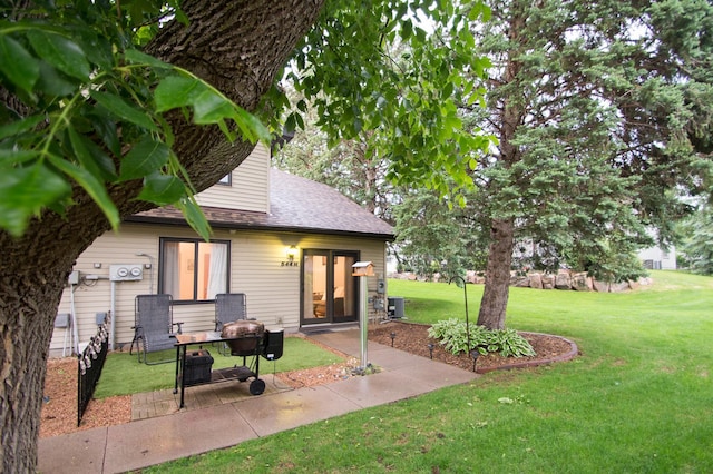 544 Auburn Pl NW Unit H, Elk River, MN 55330 - view of grassy yard with a patio area