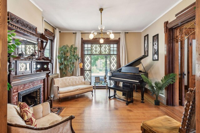 1601 Park Ave, Minneapolis, MN 55404 - sitting room with ornamental molding, wood finished floors, and a high end fireplace