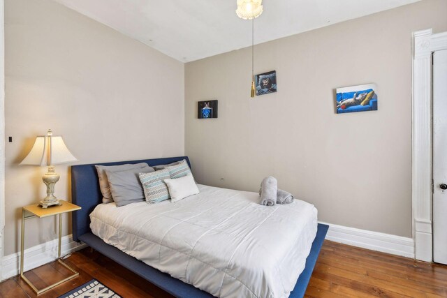 1601 Park Ave, Minneapolis, MN 55404 - bedroom featuring wood-type flooring and baseboards