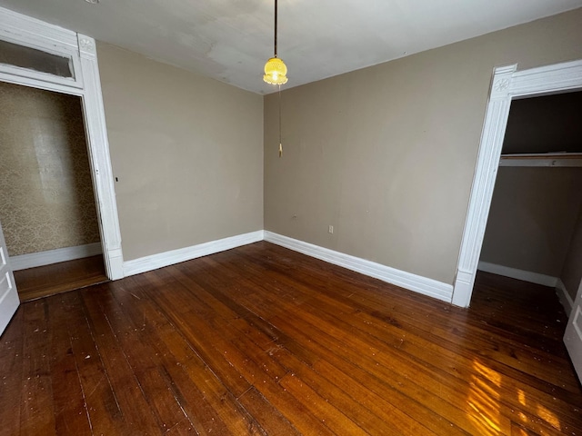 1601 Park Ave, Minneapolis, MN 55404 - unfurnished bedroom with hardwood / wood-style flooring and a closet