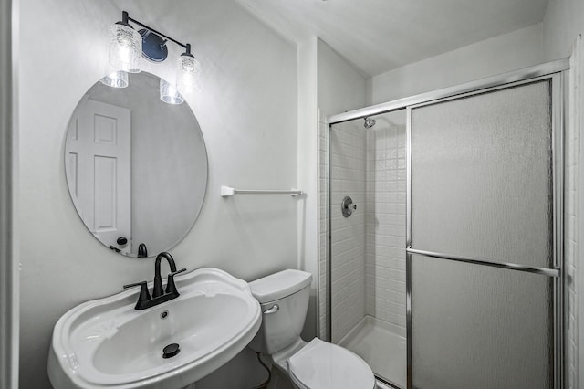 9211 Jeffery Ave S, Cottage Grove, MN 55016 - full bathroom featuring a sink, toilet, and a shower stall