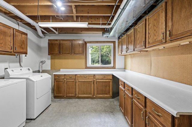 9211 Jeffery Ave S, Cottage Grove, MN 55016 - washroom with cabinet space and washer and dryer