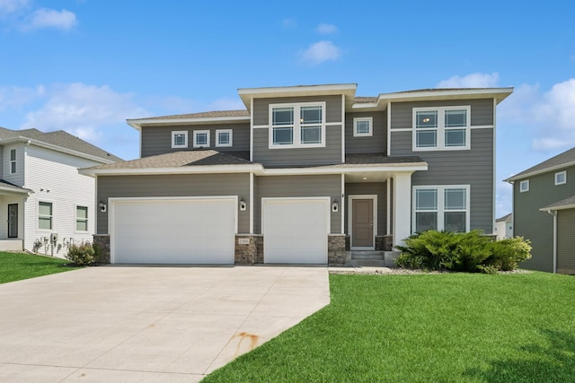 11604 Brayburn Trl, Dayton, MN 55369 - prairie-style house featuring driveway, a front yard, an attached garage, stone siding, and roof with shingles