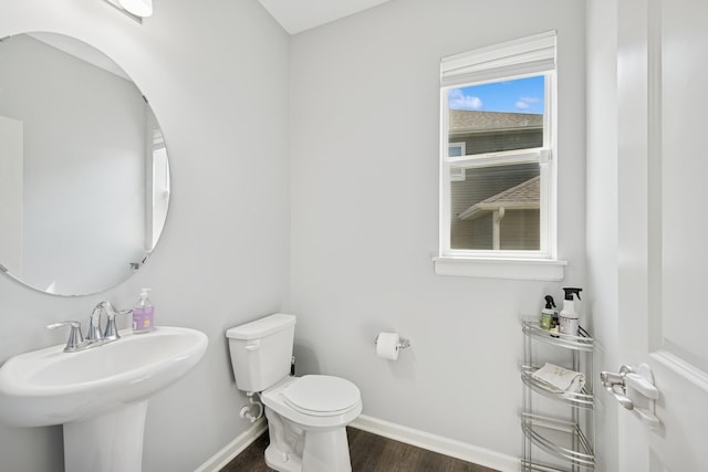 11604 Brayburn Trl, Dayton, MN 55369 - bathroom featuring baseboards and wood finished floors