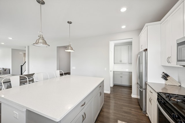11604 Brayburn Trl, Dayton, MN 55369 - kitchen with stainless steel appliances, recessed lighting, dark wood-style flooring, a center island, and hanging light fixtures