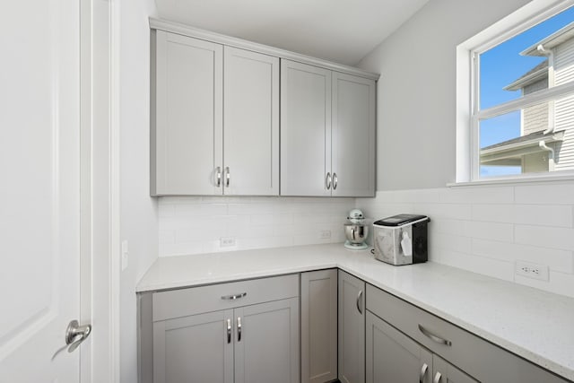 11604 Brayburn Trl, Dayton, MN 55369 - kitchen featuring gray cabinets and tasteful backsplash