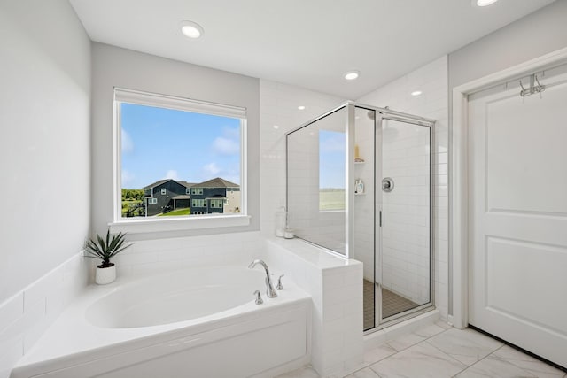 11604 Brayburn Trl, Dayton, MN 55369 - full bathroom featuring a bath, a stall shower, marble finish flooring, and recessed lighting