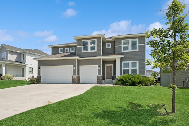 11604 Brayburn Trl, Dayton, MN 55369 - prairie-style house featuring concrete driveway, a front lawn, a garage, and stone siding