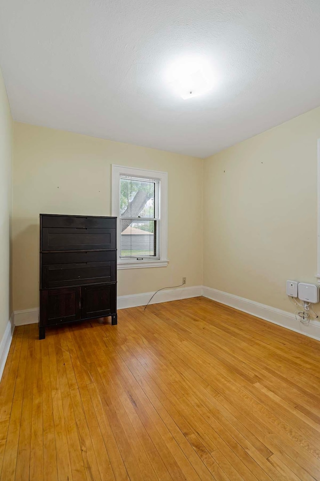 67 Lowry Ave NE, Minneapolis, MN 55418 - empty room featuring light wood-type flooring and baseboards