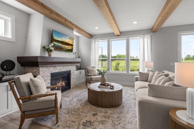 17660 Jett Cir, Prior Lake, MN 55372 - living area with beamed ceiling, light wood-style floors, a glass covered fireplace, and recessed lighting