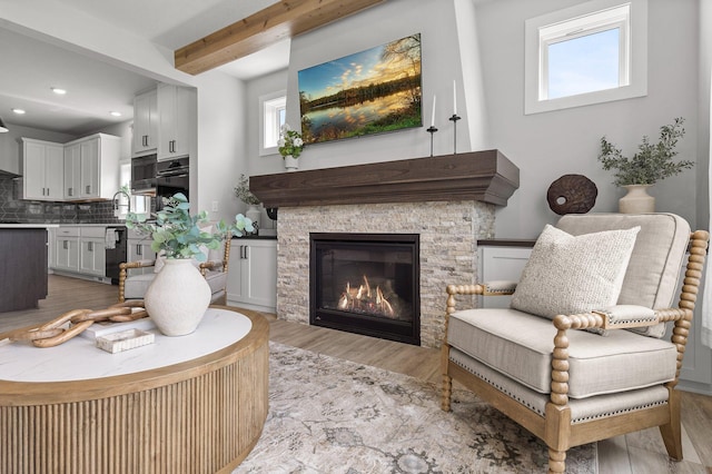 17660 Jett Cir, Prior Lake, MN 55372 - living room with light wood-style floors, beam ceiling, a fireplace, and recessed lighting