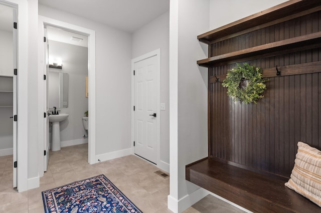 17660 Jett Cir, Prior Lake, MN 55372 - mudroom featuring baseboards and light tile patterned flooring