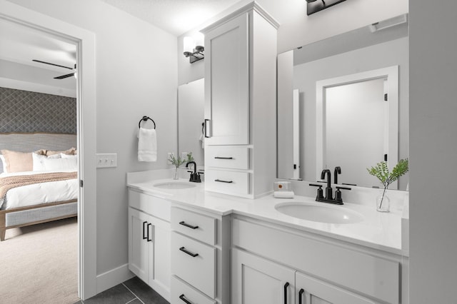 17660 Jett Cir, Prior Lake, MN 55372 - bathroom featuring double vanity, ensuite bath, and tile patterned flooring
