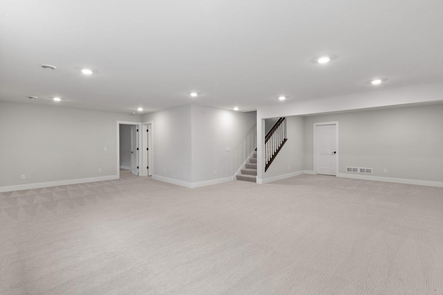 17660 Jett Cir, Prior Lake, MN 55372 - finished basement featuring stairway, recessed lighting, and light carpet