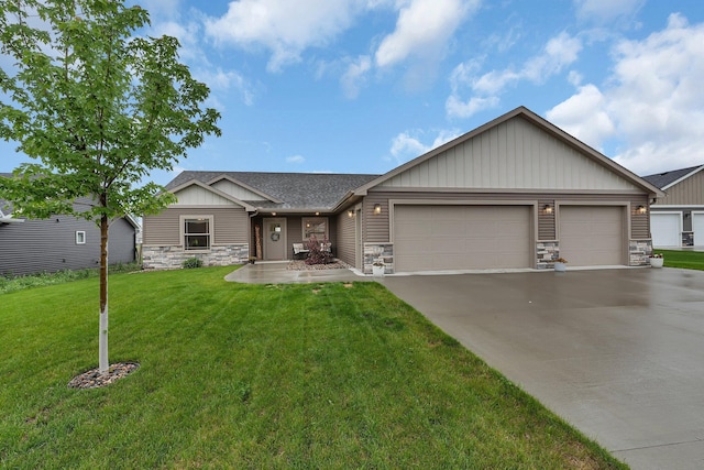 83 Meadow Ln, Cold Spring, MN 56320 - view of front of property featuring stone siding, board and batten siding, concrete driveway, a garage, and a front yard